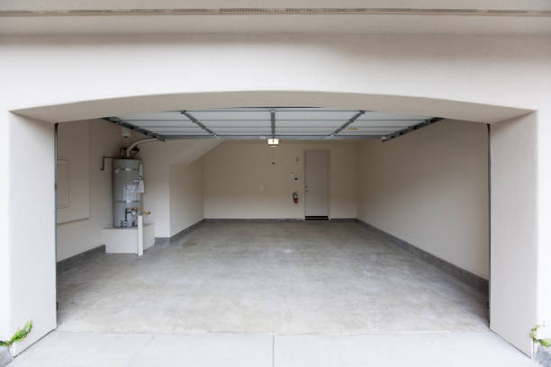 empty garage with open door, looking from outside